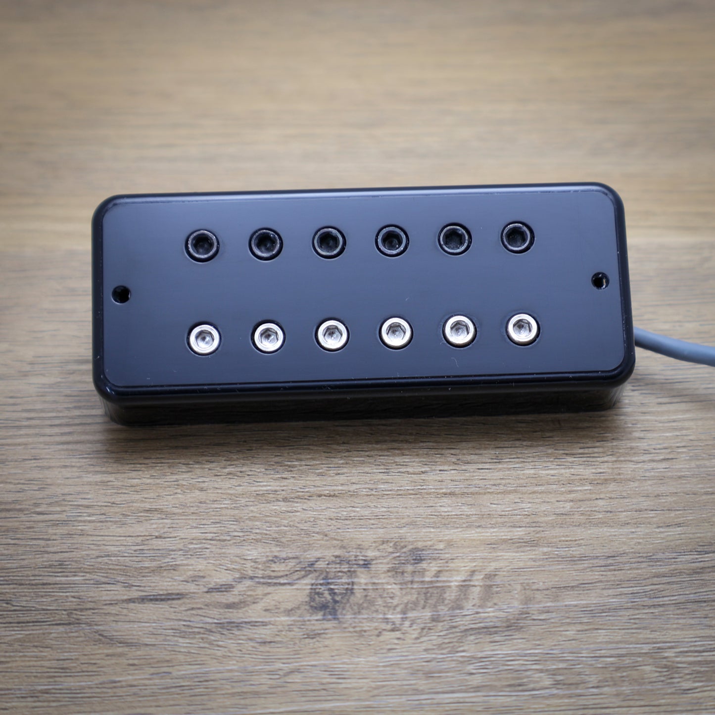 Depth Charge pickup on wooden surface