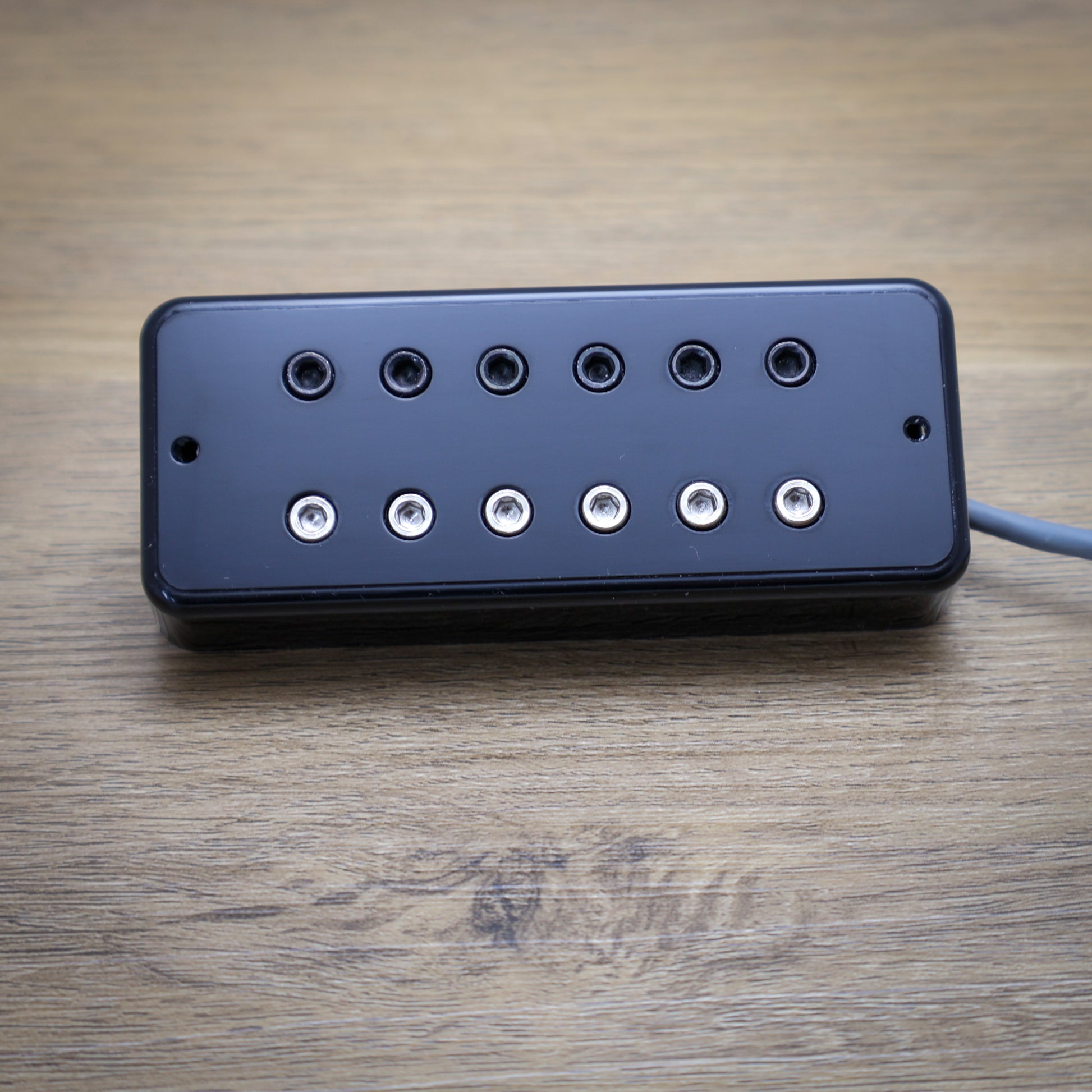 Depth Charge pickup on wooden surface