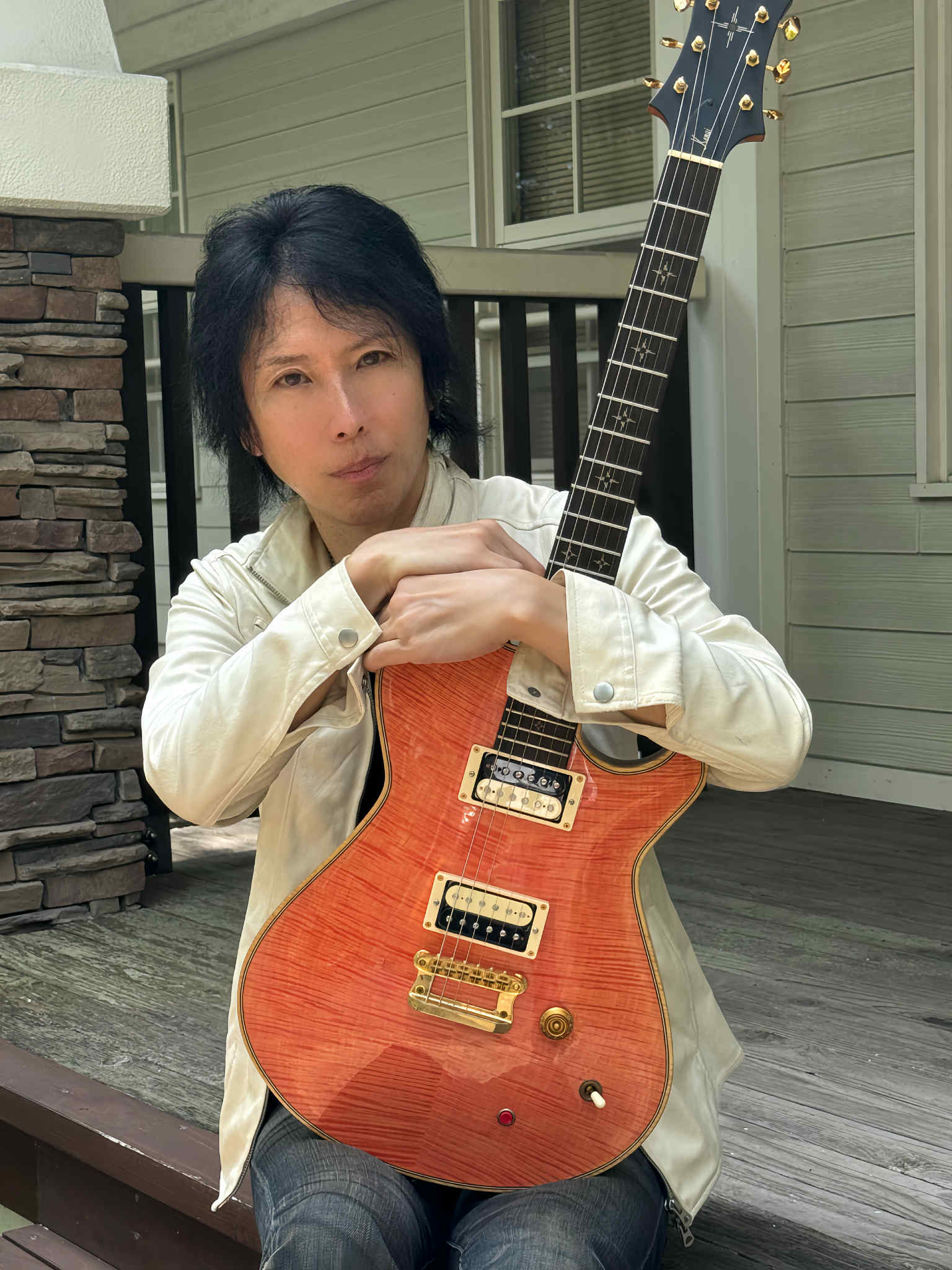 Koji Brash with Old Bones Pickups in Knaggs guitar.